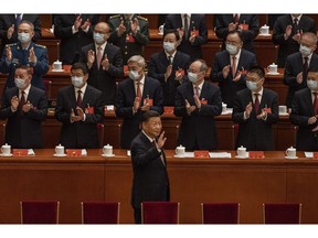 Xi Jinping is applauded as he arrives to the Opening Ceremony of the 20th National Congress of the Communist Party of China at The Great Hall of People in Beijing on Oct. 16, 2022. Photographer: Kevin Frayer/Getty Images AsiaPac