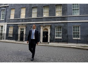 Jeremy Hunt, UK chancellor of the exchequer, departs 10 Downing Street in London, UK, on Friday, Oct. 14, 2022. UK Prime Minister Liz Truss scrapped her plan to freeze corporation tax next year in another dramatic U-turn, hours after she fired her ally Kwasi Kwarteng and replaced him with Hunt as UK Chancellor of the Exchequer.
