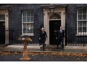 LONDON, ENGLAND - OCTOBER 20: Prime Minister Liz Truss walks out of No.10 to announce her resignation at Downing Street on October 20, 2022 in London, England. Yesterday saw the resignation of the Home Secretary followed by confusion in the House of Commons over the government vote on Fracking. Conservative MPs are openly briefing against the Prime Minister and the 1922 Committee have received letters calling for Truss's removal from one third of their MPs.