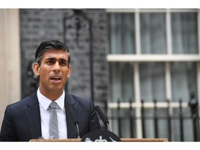Rishi Sunak, UK prime minister, delivers his first speech after becoming prime minister outside 10 Downing Street in London, UK, on Tuesday, Oct. 25, 2022. "Right now our country is facing a profound economic crisis" Sunak said shortly after becoming the first person of color to lead the British government and its youngest premier in more than two centuries.