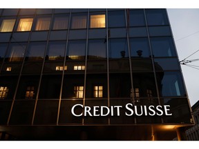 A sign on the exterior of a Credit Suisse Group AG bank branch in Basel, Switzerland, on Tuesday, Oct. 25, 2022. Credit Suisse will present its third quarter earnings and strategy review on Oct. 27. Photographer: Stefan Wermuth/Bloomberg