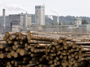 FILE-- Logs are piled up at West Fraser Timber in Quesnel, B.C., in this April 21, 2009 photo