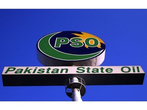 PAKISTAN - FEBRUARY 21:  A sign advertising Pakistan State Oil Co. Ltd. is displayed at one of the company's gas stations in Karachi, Pakistan on Wednesday, Feb. 21, 2007. Pakistan State Oil Co. Ltd. specializes in the marketing and storage of petroleum and related products. The Company also blends and markets lubricating oils.