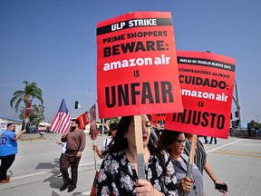 Workers at an Amazon facility in San Bernardino, Calif., protest on Oct. 14.