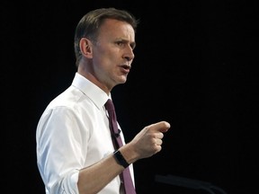 FILE - Conservative party leadership candidate Jeremy Hunt takes delivers his speech during a Conservative leadership hustings at ExCel Centre in London, Wednesday, July 17, 2019. UK leader Liz Truss has appointed former Cabinet minister Jeremy Hunt as new Treasury chief, replacing sacked Kwasi Kwarteng. Hunt is a government veteran who has served as former foreign secretary and health secretary, and ran unsuccessfully to lead the Conservative Party in 2019.