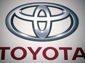 FILE - A logo of Toyota Motor Corp. at a dealer Wednesday, May 11, 2022, in Tokyo. In a Tuesday, Oct. 12, 2022, statement, Toyota Motor Corp. says it has begun assembling autos in Myanmar after a more than yearlong delay following a military takeover in February 2021.