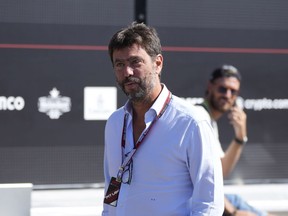 FILE- Juventus soccer team president Andrea Agnelli arrives prior to the start of the third free practice at the Monza racetrack, in Monza, Italy, Sept. 10, 2022. Juventus president Andrea Agnelli, vice president Pavel Nedved and CEO Maurizio Arrivabene are among 15 people who could face a trial for alleged false accounting and irregularities in player transfers following a notification from the public prosecutor's office in Turin.The prosecutor's office announced on Monday that 16 subjects were under investigation: Juventus and 15 people. A request for home arrest for Agnelli was rejected by a preliminary judge.