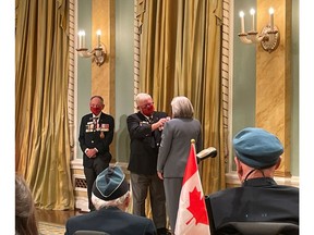 Bruce Julian pins First Poppy on Her Excellency Mary Simon