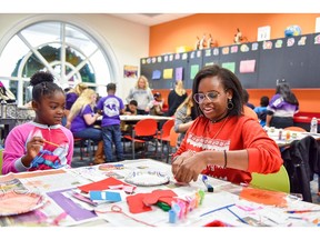 Taylor Keys, right, is pictured with a student from Montlieu Academy of Technology in High Point University's Stout School of Education during one of many events when HPU education majors partner with local elementary schools to support their students. A new more than $10.4 million grant will further HPU's partnerships and resources to develop principals and central office leaders to transform schools.