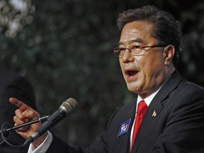 FILE - Businessman Eugene Yu speaks during a debate on Jan. 18, 2014, at the Cook County High School Performing Arts Center in Adel, Ga. Yu, the founder and CEO of a software company targeted by election deniers was arrested on Tuesday, Oct. 4, 2022, on suspicion of stealing data on Los Angeles County poll workers.