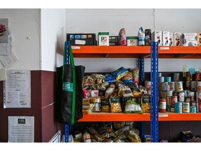 Food is piled up on shelves at the Dad's House Foodbank in West Brompton, in London, UK, on Thursday, Oct 13, 2022. Photographer: Mary Turner/Bloomberg