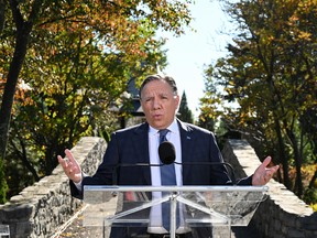 Quebec Leader François Legault speaks at a news conference in Saint-Francois onQuebec Leader François Legault speaks at a news conference in Saint-Francois on the Île d'Orléans. the Île d'Orléans.