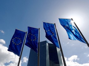European Union flags outside the European Central Bank headquarters in Frankfurt, Germany.