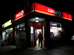 A customer enters a Circle K shop, owned by Canadian convenience-store operator Alimentation Couche-Tard, in Toronto.