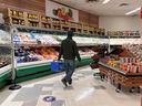 A person shops at the North Mart grocery store in Iqaluit, Nunavut.