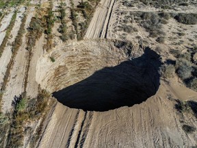 A 36.5-metre-wide sinkhole appeared near a copper mine belonging to Lundin Mining Corp. in July.