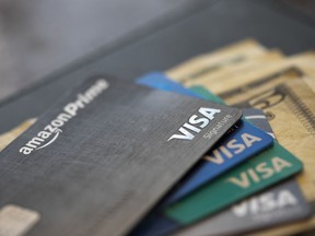 FILE - This Aug. 11, 2019 file photo shows credit cards in New Orleans. The possibility of a recession in the near future and the likely reduction in credit availability that is often associated with it may drive some small-business owners to explore financing options like a line of credit.