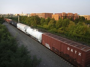 FILE - A CSX freight train travels through Alexandria, Va., Sept. 15, 2022. The major freight railroads appear unwilling to give track maintenance workers much more than they received in the initial contract they rejected, increasing the prospects for a strike. The railroads took the unusual step of issuing a statement late Wednesday, Oct. 19, 2022 rejecting the union's latest request to add paid sick time on top of the 24% raises they received in the first deal.