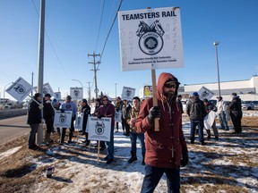 Teamster Canada Rail Conference members picket during a strike in March 2022 in Edmonton.