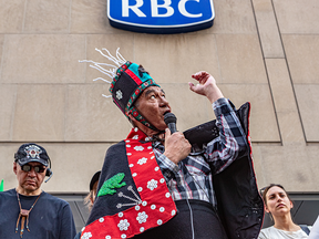 Protesters, including Wet'suwet'en hereditary chief Na'moks, gathered outside an RBC building in Montreal in the spring to protest the Royal Bank's involvement in the Coastal GasLink pipeline project on Wet'suwet'en land.