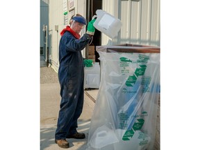 Cleanfarms' flagship container management program that collects empty plastic pesticide and fertilizer containers for recycling continues to gain ground.  Cleanfarms released take-back rates for 2021 showing Canadian farmers returned 77% of empty 23L and smaller jugs in 2021, up from 71% in 2019. Cleanfarms makes large plastic collection bags, shown here, are available at ag retailers to make it easier for farmers to safely manage and return empty containers.  – Photo by Cleanfarms