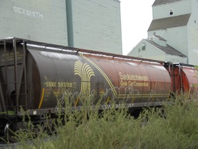 A train passes by the Sexsmith grain elevator in Alberta, in 2011.