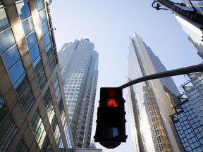 A crosswalk sign flashes red in Toronto's financial district.