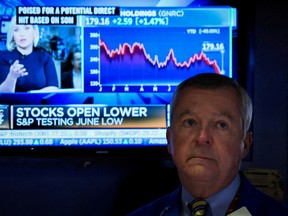A trader works on the floor of the New York Stock Exchange in September.