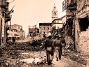 Soldiers walk through the rubble of battle in Remini, Italy during the Second World War. Investment advisor Arthur Salzer says the period following the war provides a useful comparison for today's economic situation.