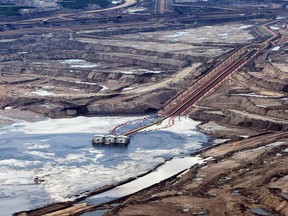 An oil sands facility seen from a helicopter near Fort McMurray, Alta., on July 10, 2012. I
