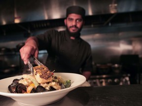 Chatterpaul's chef plating a dish. PHOTO SUPPLIED.