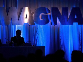 The Magna International Inc. logo is seen prior to the company's annual general meeting to begin in Toronto on Friday, May 10, 2013. Magna International Inc. says it earned US$289 million in its third quarter, up from US$11 million in the same quarter last year.