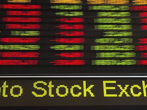 Financial numbers flow on the digital ticker tape at the TMX Group in Toronto's financial district on May 9, 2014.