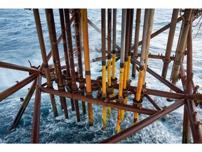 Pipes used to extract gas condensate from the Armada gas field extend from the seabed to the Armada gas condensate platform, operated by BG Group Plc, in the North Sea, off the coast of Aberdeen, U.K., on Thursday, Dec. 10, 2015.  Photographer: Simon Dawson/Bloomberg