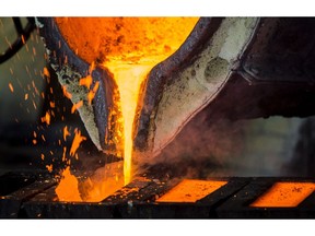 A molten mixture of lead and bronze pours from a cauldron into moulds in the foundry at the copper mining and smelting complex, operated by RTB Bor Group, in Bor, Serbia, on Tuesday, Feb. 28, 2017. Mining and Smelting Combine Bor is the only producer of copper and precious metals (gold and silver) in Serbia. Photographer: Oliver Bunic/Bloomberg