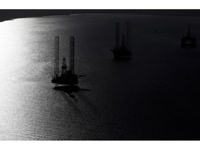 Mobile offshore drilling units stand in the Port of Cromarty Firth in Cromarty, U.K., on Wednesday, March 22, 2017. Even as oil production declined in the North Sea over the last 15 years, economic activity has been buoyed by offshore windmills. Photographer: Chris Ratcliffe/Bloomberg