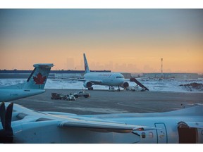 CALGARY, ALBERTA - NOVEMBER 17: Aircraft of Air Canada at Calgary Airport on November 17, 2014 in Calgary, Canada.