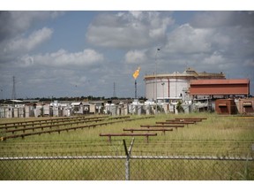 An oil tank stands at the Petroleos de Venezuela SA (PDVSA) Petropiar facility in El Tigre, Venezuela, on Sunday, Oct. 14, 2018. State-owned PDVSA doesn't publish statistics, but environmentalists and analysts keep seemingly endless lists of examples of wayward crude - unleashed by busted valves, ripped gaskets, and cracked pipes - that they say has polluted waterways and farmland and probably has seeped into the nation's aquifers.