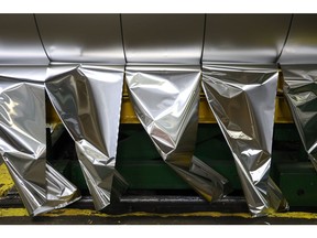 Aluminum foil on the production line at the Sayanal foil mill, operated by United Co. Rusal, in Sayanogorsk, Russia, on Wednesday, May 26, 2021. United Co. Rusal International PJSC's parent said the company has produced aluminum with the lowest carbon footprint as the race for cleaner sources of the metal intensifies.