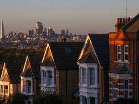 Skyscrapers and buildings atop residential houses on the London skyline at dusk in London, UK, Thursday, October 21, 2021. UK Prime Minister Boris Johnson said the city of London would prosper outside the European Union, noting job losses and disruption to capital flows have been less than feared. Photographer: Chris Ratcliffe/Bloomberg via Getty Images
