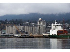 The G3 Terminal Vancouver, a grain export terminal, in North Vancouver, British Columbia, Canada, on Saturday, Nov. 20, 2021. Mountains of wheat and canola are stranded in Canada after storms blocked access to the Port of Vancouver during peak shipping season.