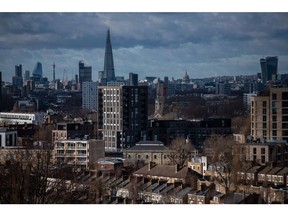 The Shard skyscraper on the skyline beyond residential property in London, U.K., on Tuesday, Feb. 1, 2022. U.K. house prices registered their strongest start to the year since 2005 but the property market is set for a slowdown as the cost of living crisis intensifies, according to Nationwide Building Society. Photographer: Chris J. Ratcliffe/Bloomberg