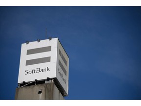 Signage displayed atop a SoftBank Corp. store in Tokyo, Japan, on Tuesday, May 10, 2022. SoftBank Group Corp. is scheduled to release its full-year results on May 12. Photographer: Akio Kon/Bloomberg