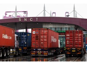 Container trucks enter the Sun Kwang Newport Container Terminal (SNCT) in Incheon New Port in Incheon, South Korea, on Wednesday, June 15, 2022. Striking truckers in South Korea reached an agreement with the government, ending a weeklong strike that threatened the nation's economy and added to strains on global supply chains. Photographer: SeongJoon Cho/Bloomberg