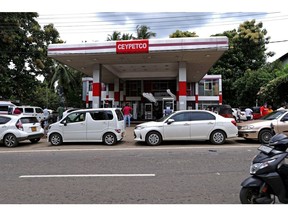 Motor vehicles are seen lined up near a fuel station in Kandy, Sri Lanka, on Friday, June 17, 2022. Photographer: Buddhika Weerasinghe/Bloomberg