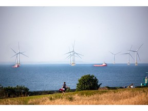 The Aberdeen Bay Wind Farm, operated by Vattenfall AB, beyond the Nigg Bay Golf Club in Aberdeen, UK, on Monday, July 18, 2022. Aberdeen in northeast Scotland is trying to make the leap from an oil town to a renewables hub amid growing demand for cheap home-grown energy. Photographer: Emily Macinnes/Bloomberg