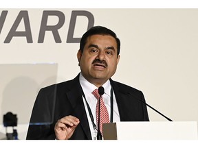 Adani Group Chairman Gautam Adani speaking during the Forbes CEOs Summit in Singapore on September 27, 2022.  India needs fossil fuels to serve a large population and getting rid of all fossil fuels immediately will not work for the country, Adani said.