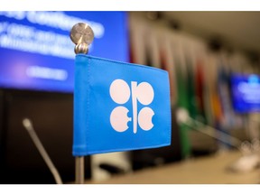 An OPEC-branded flag on a delegate desk ahead of the 33rd meeting of the Organization of Petroleum Exporting Countries (OPEC) and non-OPEC countries in Vienna, Austria, on Wednesday, Oct. 5, 2022. OPEC+ is considering its biggest production cut since 2020 as it tries to stabilize oil prices, a move that risks cranking up tensions with Washington. Photographer: Akos Stiller/Bloomberg