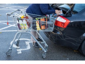 A customer packs shopping into the boot of a car at an Aldi Stores Ltd. supermarket in Sheffield, UK, on Saturday, Oct. 15, 2022. The Office for National Statistics are due to release the latest UK CPI Inflation data on Wednesday.
