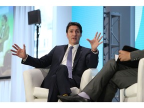 Justin Trudeau, Canada's prime minister, speaks during the Ottawa Climate Conference in Ottawa, Ontario, Canada, on Tuesday, Oct. 18, 2022. Trudeau said he wants Canada to compete with US green incentives.